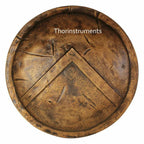 Decorative metal plate with a shield design and 'Thorinstruments' branding on a white background