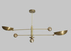 Brass chandelier with five arms on a gray background