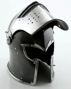 Black and silver medieval helmet on a white background
