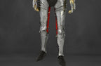 Metallic armor with red accents on a dark background