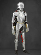 Full suit of silver armor on a dark background