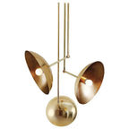 Gold pendant light fixture on a white background