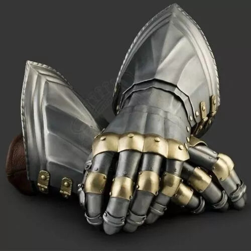 Close-up of a detailed metal gauntlet with gold accents on a dark background