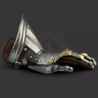 Gothic-style arm with armor and leather details on a dark background