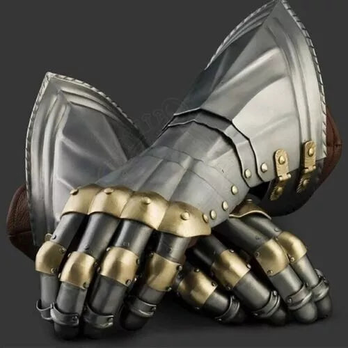 Close-up of a detailed metal gauntlet with gold accents on a dark background